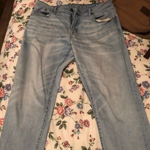 American Eagle whitewashed pants with a small hole